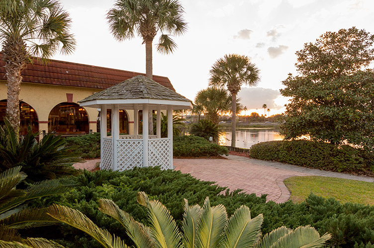 Exterior shot of a small shed near the water at our family friendly resort in Kissimmee FL.